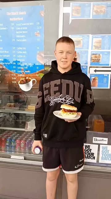 A happy customer with his burger